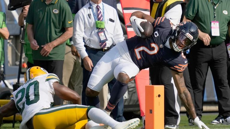 Chicago Bears wide receiver DJ Moore (2) is tackled by...