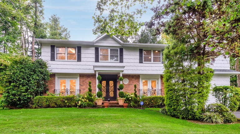 This five-bedroom, 4½-bath Colonial features a newly landscaped, terraced backyard.