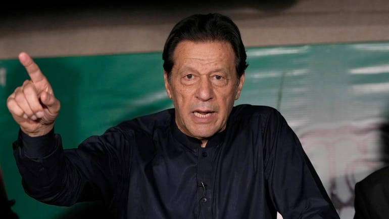 Pakistan's former Prime Minister Imran Khan speaks during a news...