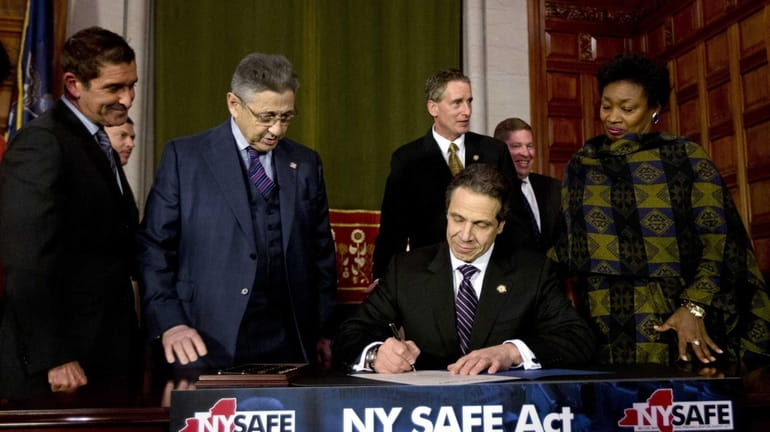 New York Gov. Andrew Cuomo signs New York's Secure Ammunition...