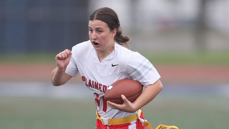 Plainedge's Jess Faranda (11) runs the ball in the second...