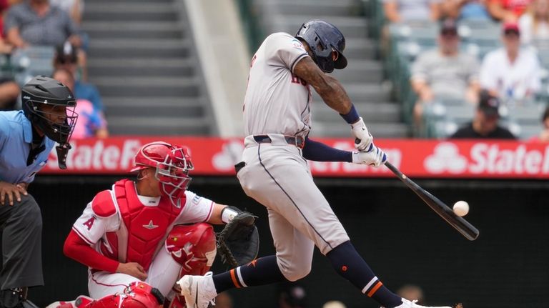 Houston Astros' Jason Heyward hits a home run during the...