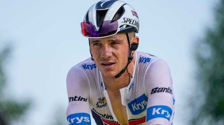 Belgium's Remco Evenepoel, wearing the best young rider's white jersey,...