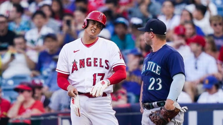 Mike Moustakas' three-run homer powers Shohei Ohtani, Angels to win - Los  Angeles Times