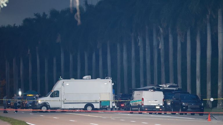 Police crime scene vehicles are seen at Trump International Golf...