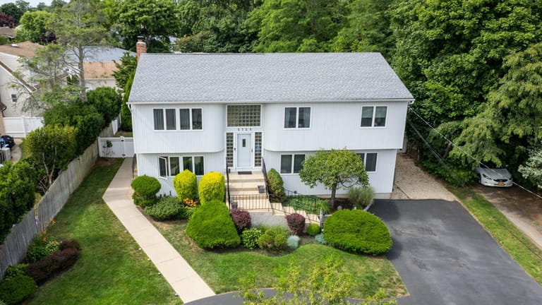 This $898,000 North Bellmore home was built in 1995.