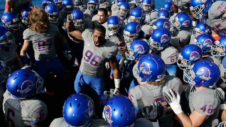 Jarrell Root of the Boise State Broncos psyches up his...