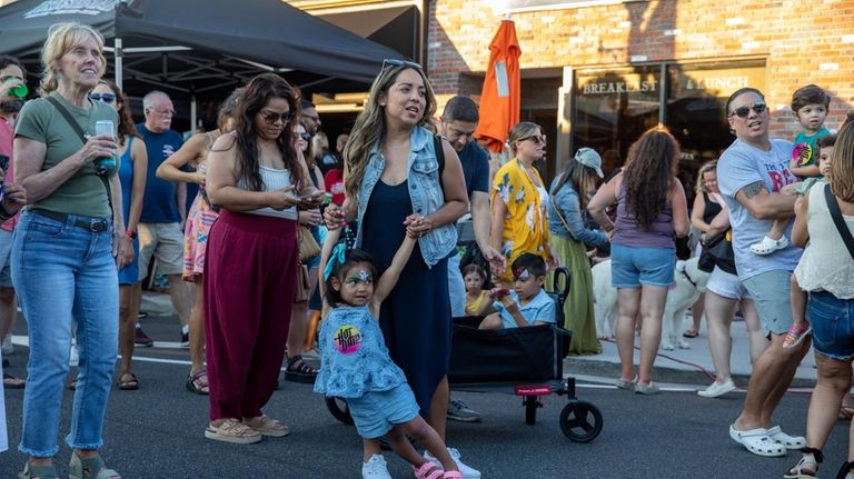 Johanna Osorio and her daughter Isabela, 3, of West Babylon,...