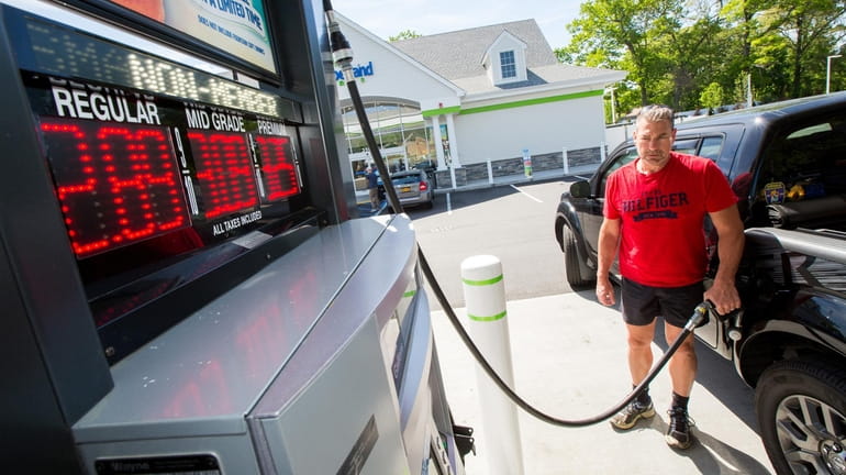 Michael Hever of Commack fills up at the Cumberland Farms...