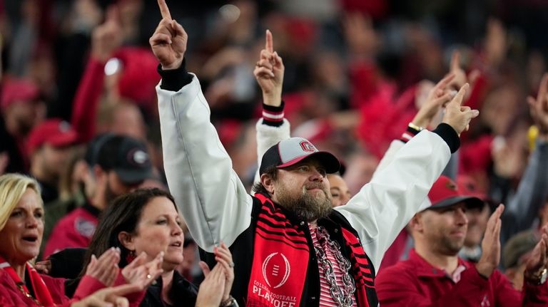 Georgia fans cheer during the second half of the national...