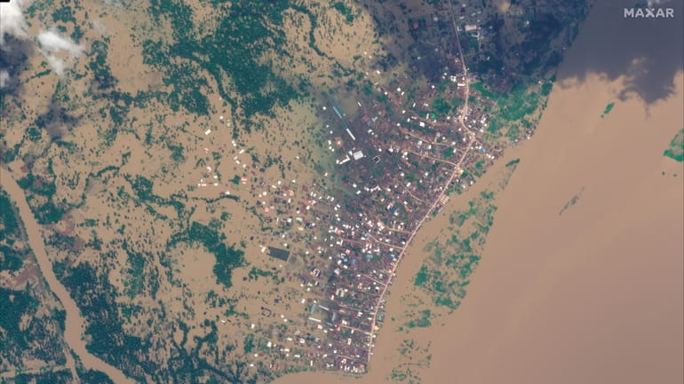 This satellite image shows floodwaters surrounding Aboh, Nigeria, Nov. 1.