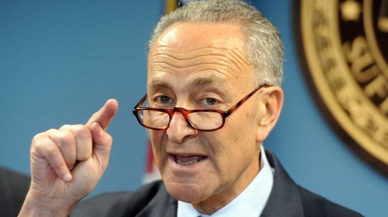 Sen. Chuck Schumer talks during a press conference in Hauppauge...