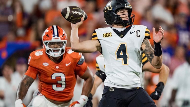 Appalachian State quarterback Joey Aguilar (4) looks to pass the...