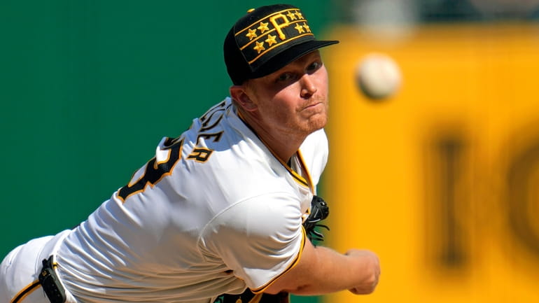 Pittsburgh Pirates starting pitcher Mitch Keller delivers during the second...
