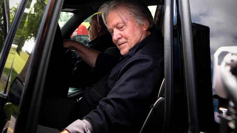 Steve Bannon gets into his car before reporting to Danbury...