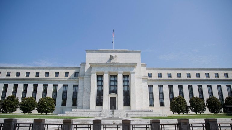 The Federal Reserve Building on Constitution Avenue in Washington as...