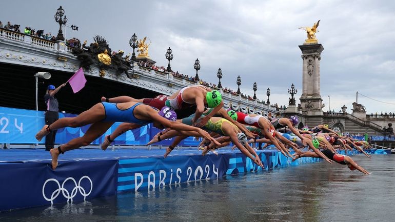 Competitors start the swimming leg of the Women's Individual Triathlon...