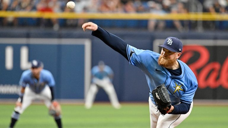 Tampa Bay Rays pitcher Drew Rasmussen throws against the Arizona...