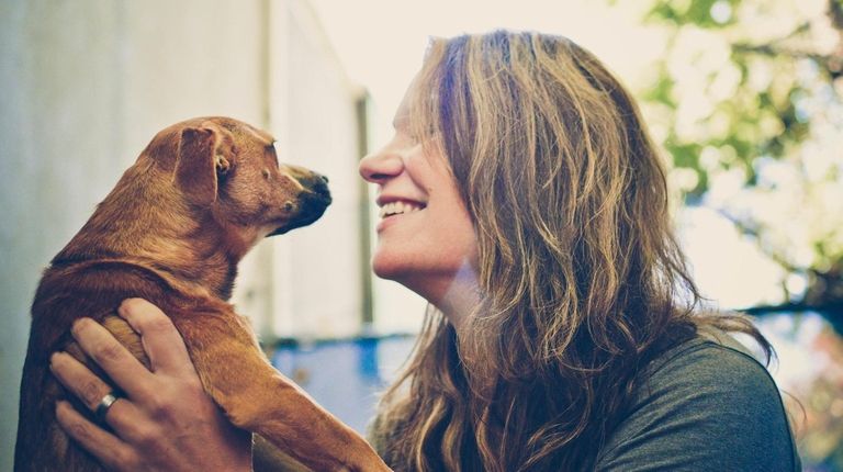 Marianne Deszcz, owner of a dog day care and boarding...