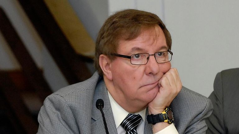 North Dakota Sen. Ray Holmberg listens during a joint House...