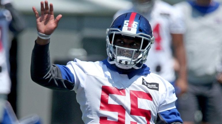 New York Giants linebacker Reggie Ragland (55) gestures to his...