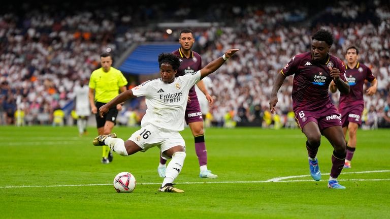 Real Madrid's Endrick scores his side's third goal during the...