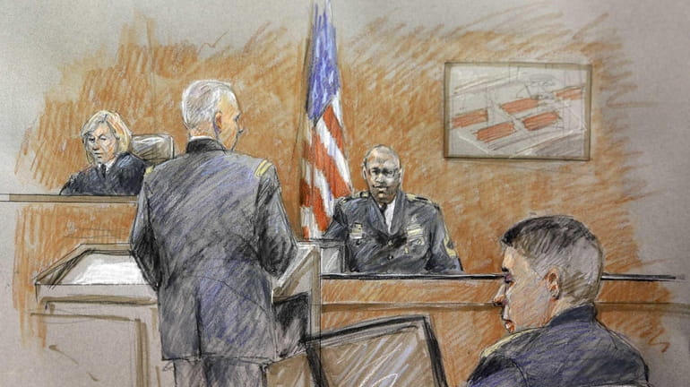 In this courtroom sketch, Staff Sgt. Alonzo Lunsford, rear right,...