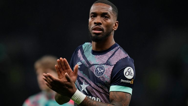 Brentford's Ivan Toney applauds fans after the English Premier League...