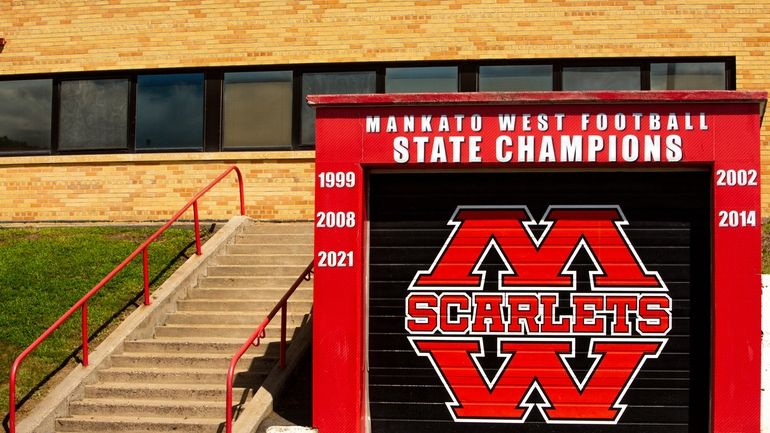 Mankato West High School's football state championship wins are painted...