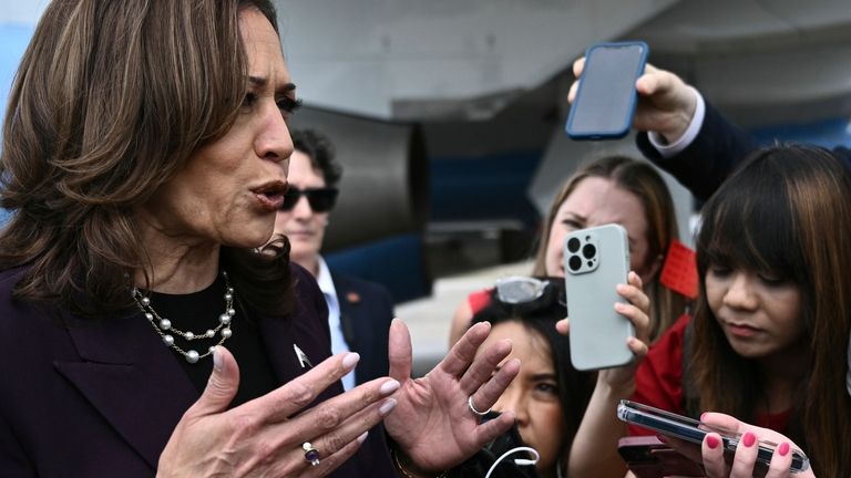 Vice President Kamala Harris speaks to reporters upon arrival at...