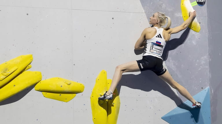 Slovenia's Janja Garnbret competes during the women's Boulder Final at...