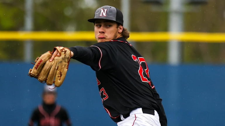 Matt Hesselbirg for Newfield delivers a pitch during a Suffolk...