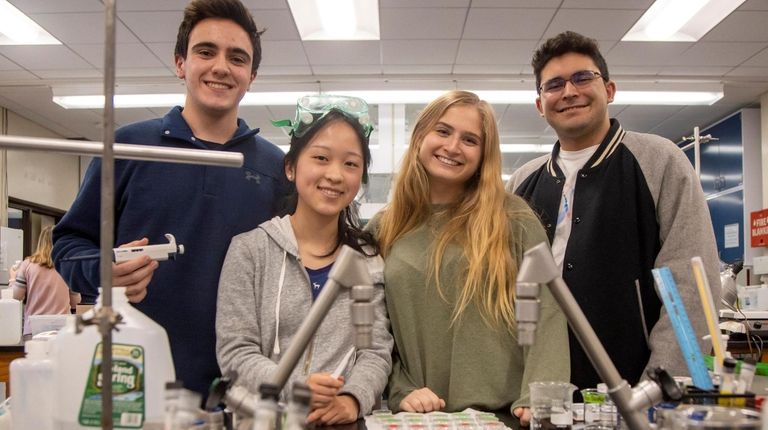 Manhasset High School's Regeneron scholars — Kevin Carratu, Elizabeth Wu,...