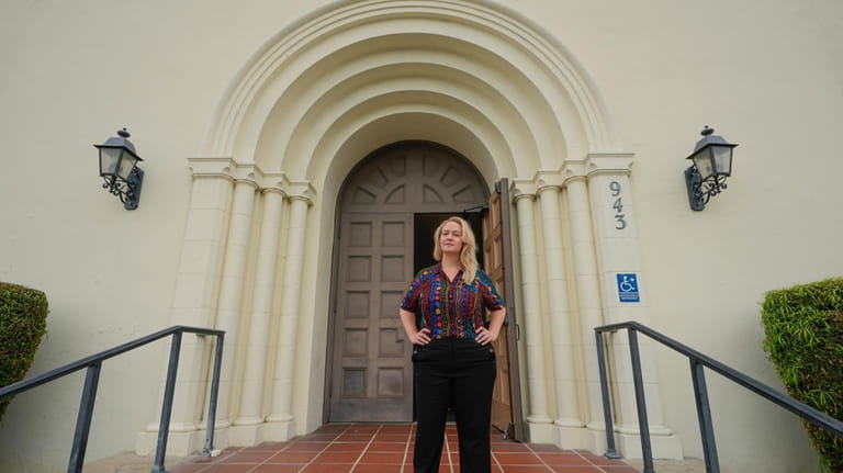 Pastor Ruth Schmidt poses for a picture at the Altadena...