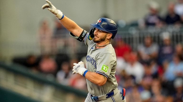 Toronto Blue Jays' Spencer Horwitz (48) celebrates his solo homer...