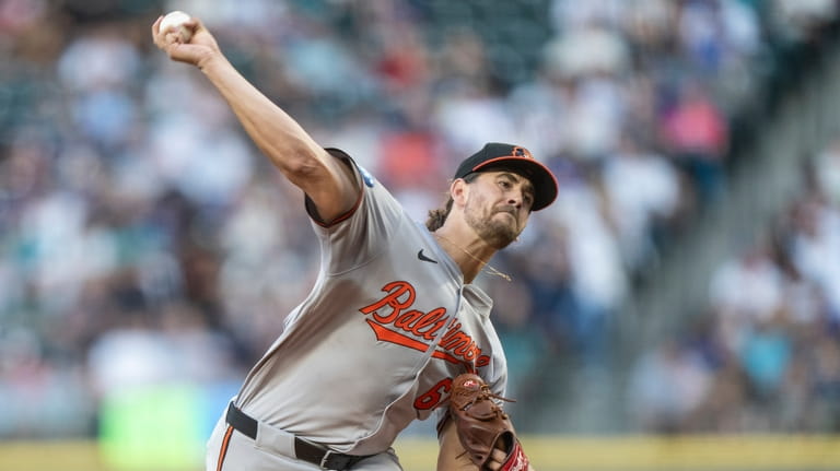 Baltimore Orioles starter Dean Kremer delivers a pitch during the...