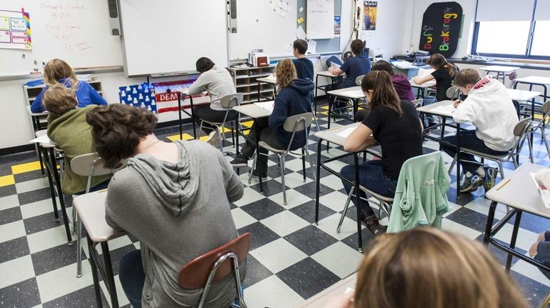 Eighth-grade students take the New York State 2015 Common Core...