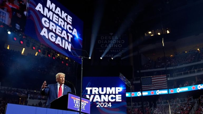 Republican presidential nominee former President Donald Trump speaks at a...