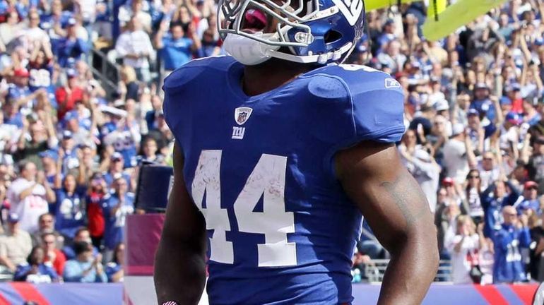 Ahmad Bradshaw #44 of the New York Giants celebrates a...