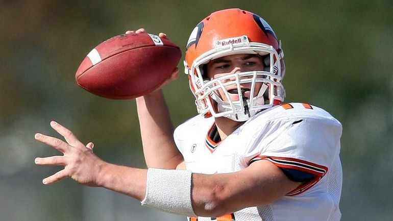 Carey's QB #11 Kyle Zahradka fires a pass down field...