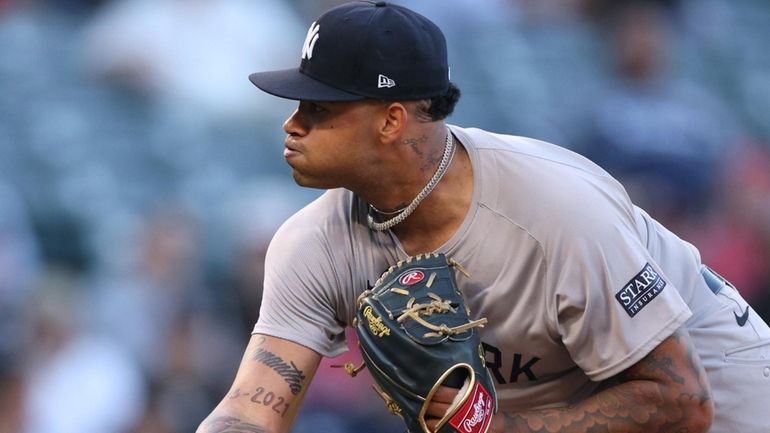 Luis Gil #81 of the Yankees pitches during the first inning...