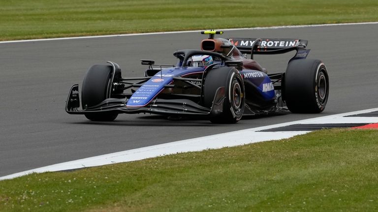 Williams driver Franco Colapinto of Argentina steers his car at...