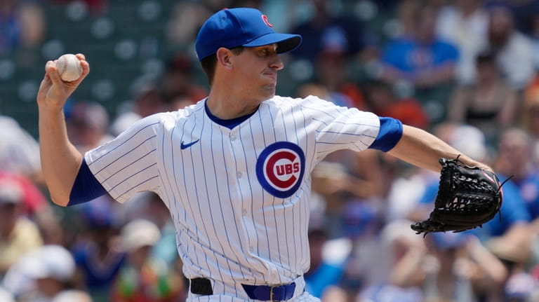 Chicago Cubs starting pitcher Kyle Hendricks throws against the San...