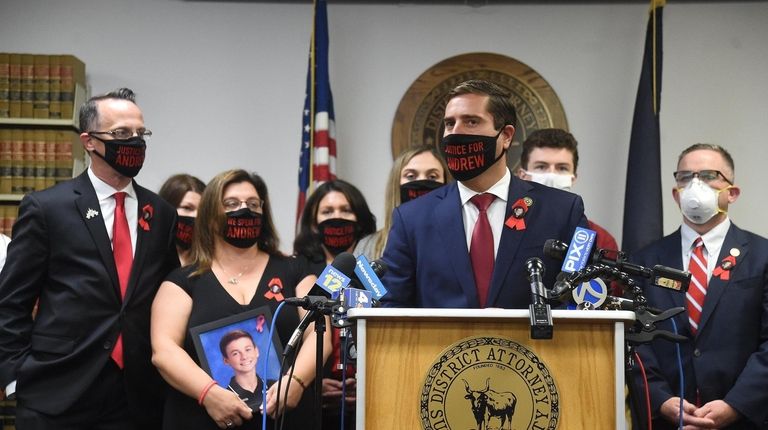 Suffolk County District Attorney Timothy D. Sini, during a news conference,...