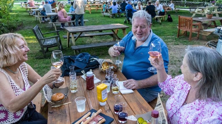 Patrons enjoying burger night at McCall Wines in Cutchogue.