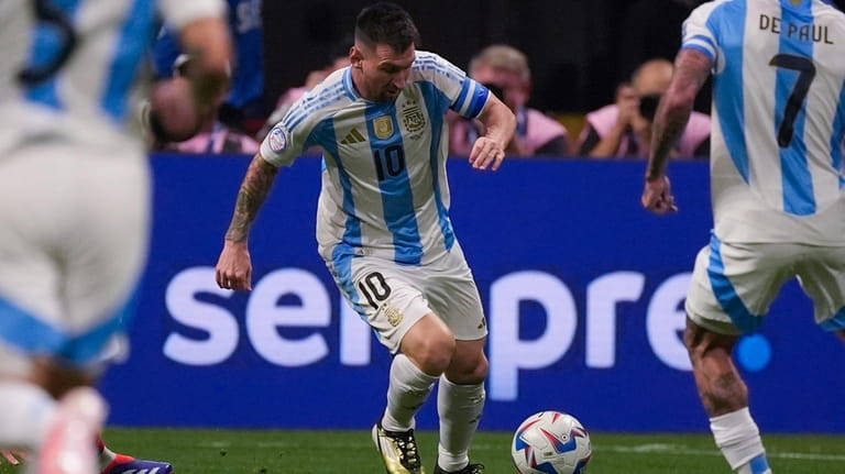 Argentina's Lionel Messi controls the ball during a Copa America...