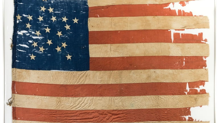 This image provided by Heritage Auctions, shows 21-star U.S. flag....