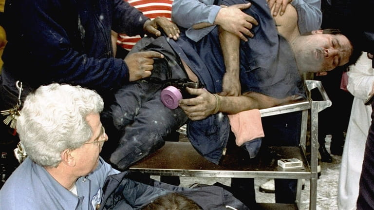 Victims of a fire at the World Trade Center in...
