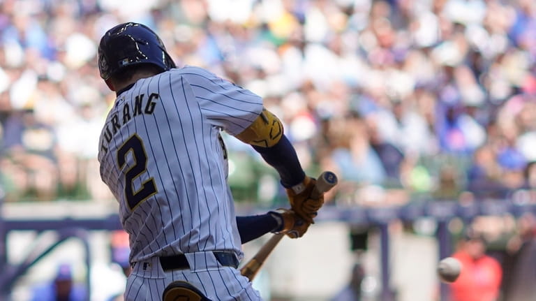 Milwaukee Brewers' Brice Turang hits a grand slam during the...