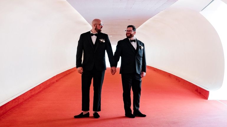 Jonathan Pollino, left, and Doug Kupferman were married at the...